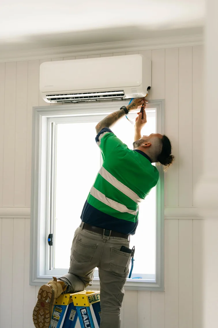 Blair Data & Electrical electrician working on a switchboard